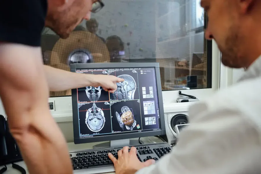 Scientist reviewing brain scans in a laboratory
